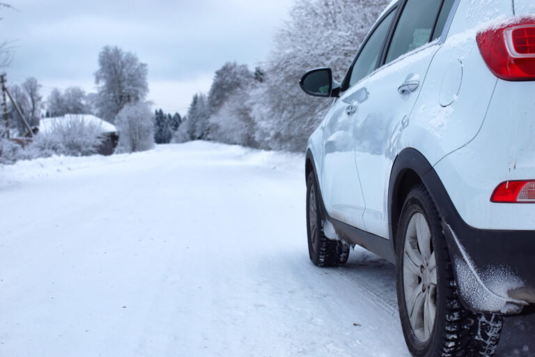 Landscape road in the winter forest with snow covered wilderness -Winter Driving